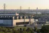 Data center and electrical transmission equipment with the U.S. Capitol in the distance