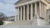 The United States Supreme Court’s marble steps and columns in soft morning daylight
