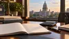 Illustrative government finance workspace with a ledger and the Illinois State Capitol softly blurred in the background.