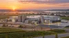 Modern food-and-beverage production facility planned in a southeastern Indiana landscape.