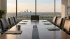 Conceptual view of an empty Indiana economic-development conference room prepared for a leadership meeting.
