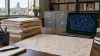 Illustration of paper records, an Iowa map and a laptop showing a network diagram in a municipal office.