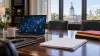 Illustrative Maryland government conference table with a laptop showing an abstract artificial-intelligence network.