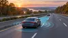 Conceptual editorial image of a car using intelligent speed-assistance technology on a Maryland highway