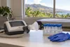 Spirometry equipment and sealed laboratory sample vials in a Maui community health screening room