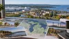 Conceptual Michigan planning workspace overlooking manufacturing, a small downtown, utility infrastructure, forests and lakes.