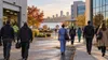 Workers arrive at a generic Minnesota manufacturing, health-care and office district on an early autumn morning.