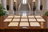 Thirteen blank license folders arranged on a legal desk inside a symbolic courthouse, with cannabis leaves at the edges.