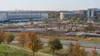 Construction site with logistics and health-care buildings in a Midwestern employment district