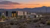 Illustrative data center beside transmission lines in Nevada’s arid landscape