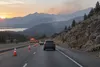 Conceptual view of a one-lane Interstate restriction near a smoky mountain slope west of Reno.