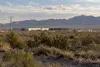 Conceptual view of a generic industrial development and power lines in the southern New Mexico desert