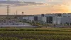 Modern data center buildings, power infrastructure and farmland in Ohio