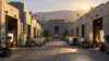 Illustrative view of converging film studio soundstages in Los Angeles.