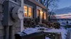 Representative winter scene of a Rhode Island home with an electric meter and an unreadable utility bill.