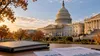 Illustrative view of the U.S. Capitol with financial documents in the foreground.
