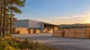 Illustrative wood-products manufacturing building with stacked pine lumber in upstate South Carolina