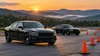 Unmarked patrol sedans on a driver-training course against wooded Tennessee hills.