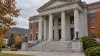 Illustration of a generic Vermont courthouse exterior in autumn under an overcast sky