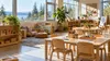 An empty early-learning classroom with child-sized tables, books and art supplies overlooking a Pacific Northwest landscape.
