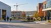 Workers arrive at a generic Wisconsin manufacturing, construction and health-care district on an early autumn morning.
