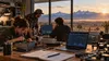 A Wyoming technology startup team works on electronics prototypes in a workshop overlooking high plains and mountains.