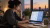 A laptop user reviews generic privacy permission controls in a home office.