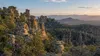 Rhyolite rock spires and forested high-desert terrain in an illustrative view of Chiricahua National Park, Arizona