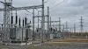 AI-generated illustrative electrical substation beneath an overcast autumn sky; not a photograph of an attacked facility.