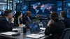 Illustrative image of officials and cybersecurity analysts conducting a coordinated incident-response exercise