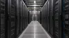 AI-generated illustration of unbranded server cabinets in a generic data-center aisle; not a photograph of a Georgia facility.