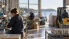 Illustrative view of anonymous workers in a clean Maine manufacturing and logistics workplace.