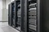 AI-generated illustrative image of unbranded rack servers in a computing equipment room; not a Modal facility or a depiction of Vera hardware.