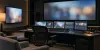 An empty professional streaming-content review suite with multiple editing monitors and a large screening display