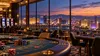 Illustrative view of an unbranded Nevada casino floor overlooking a generic desert resort skyline.