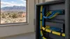 AI-generated illustration of unmarked broadband equipment overlooking a northern New Mexico-style landscape; not a photograph of the funded project.