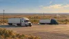 AI-generated illustration of trucks in a freight parking area; not the proposed Los Indios or Fort Worth facility.