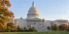 AI-generated illustrative view of the U.S. Capitol in soft daylight with autumn foliage; not a photograph of a current event.