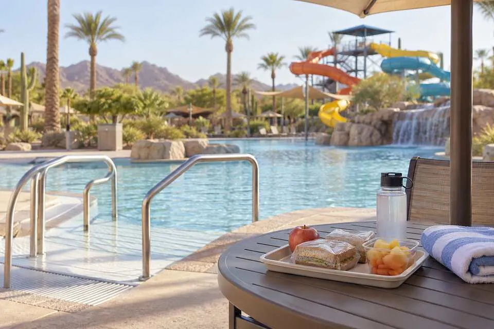 Accessible pool entry and a prepared meal tray at a generic Arizona water park