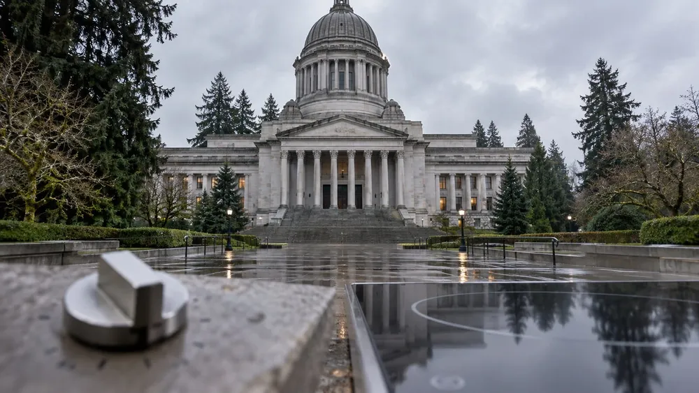 Conceptual view of a rain-soaked Washington state capitol with unbranded gas and electric cooking controls in the foreground