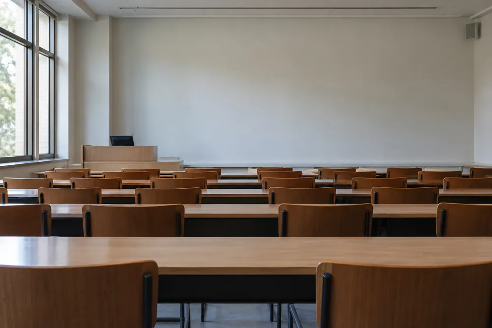 AI-generated illustrative view of an empty university lecture room, not a photograph of UNC–Chapel Hill.