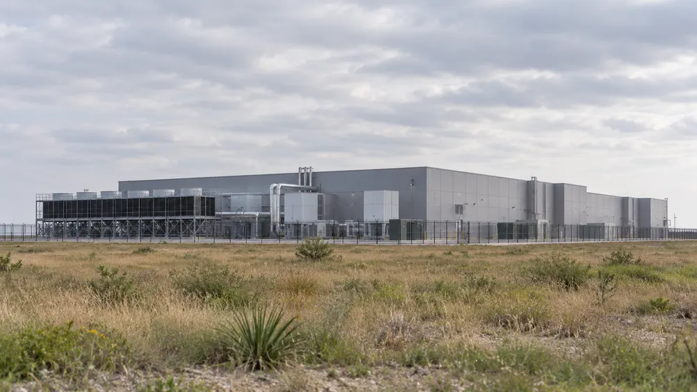 AI-generated illustration of a generic data-center building on flat Texas-style terrain; not a photograph of a named project, current construction or an observed permitting violation.