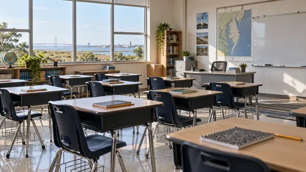 An empty, naturally lit Delaware public-school classroom prepared for a new academic program.