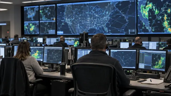 Personal de operaciones de tránsito aéreo monitorea rutas de vuelo y sistemas meteorológicos en un moderno centro de control