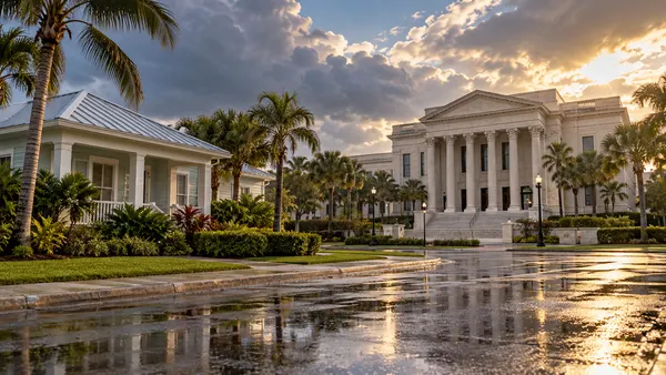 Rain-wet Florida residential street with a coastal home facing a neutral courthouse under clearing storm clouds.