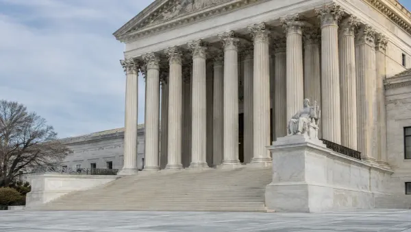 The United States Supreme Court’s marble steps and columns in soft morning daylight
