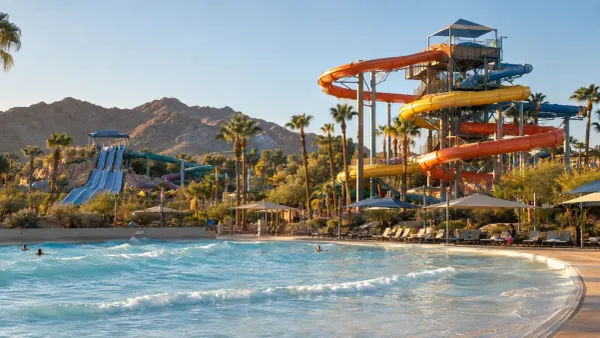 Water slides and a wave pool at a quiet Arizona water park in late-afternoon sunlight