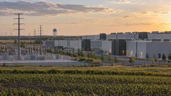 Modern data center buildings, power infrastructure and farmland in Ohio