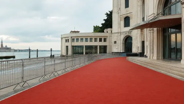 Empty red carpet outside a waterfront cinema on the Venice Lido before festival arrivals