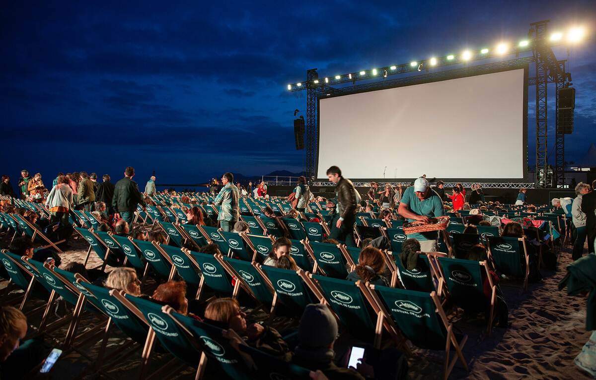 Open movie theatre with audience